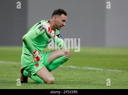 Albania goalkeeper Etrit Berisha reacts after England's second goal, scored by Mason Mount (not pictured) during the FIFA 2022 World Cup qualifying match at the National Arena in Tirana, Albania. Picture date: Sunday March 28, 2021. Stock Photo