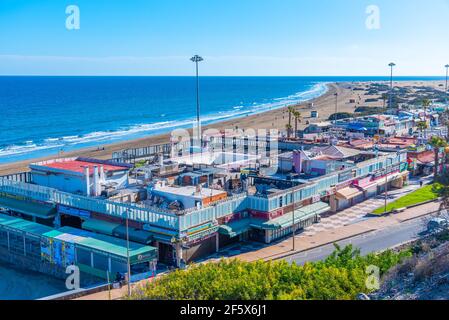 Maspalomas, Spain, Janury 19, 2021: Seaside shops and restaurants at Maspalomas at Gran Canaria, Canary islands, Spain. Stock Photo
