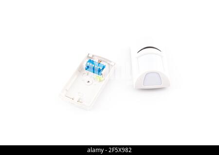 Corner Adapter and Motion Sensor Alarm Isolated on White Background Stock Photo