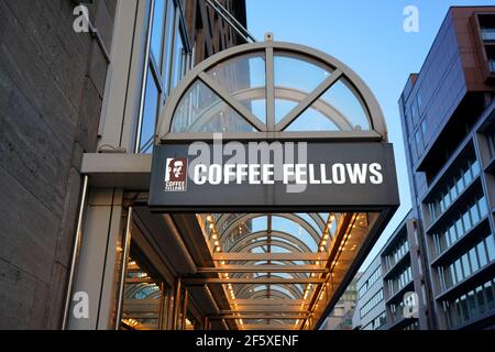 Exterior logo of the coffee shop 'Coffee Fellows' on Königsallee in Düsseldorf. 'Coffee Fellows' is a German coffee shop chain. Stock Photo