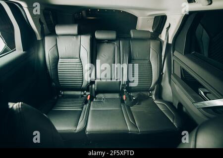 Moscow, Russia - December 20, 2019: Rear seats and leather interior of a premium car Land Rover Discovery Sport 2020. Stock Photo