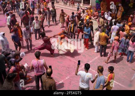 People enjoying the Holi of Nandgaon. Throwing colors in Air Stock Photo