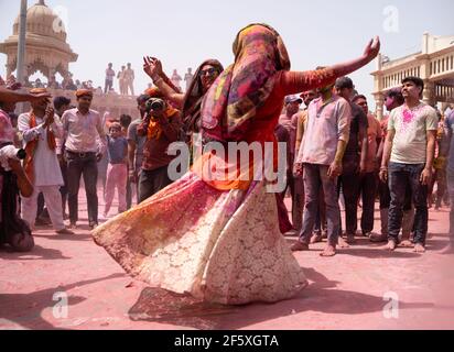 Devotees came from all over India enjoying Nandgaon Holi in the temple Stock Photo