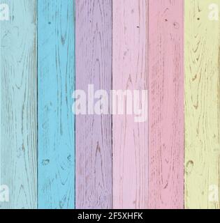 A wooden boards with a rustic look painted in pastel shades of blue, pink, purple and yellow. Background for wedding themes and vintage style events. Stock Photo