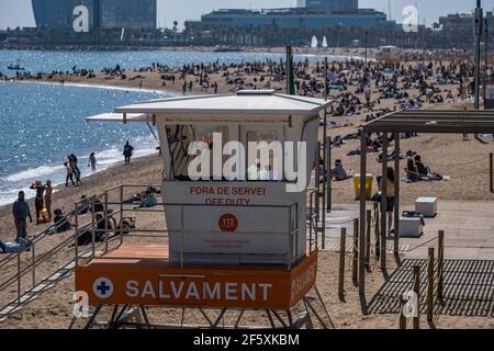 Barcelona, Spain. 28th Mar, 2021. View of a new watchtower for beach lifeguards that replace the traditional raised chairs on the beach at the coast of Barcelona.Barcelona's beaches kick off the new 2021 beach season with the deployment of 21 new watchtowers for beach lifeguards that replace traditional raised chairs. (Photo by Paco Freire/SOPA Images/Sipa USA) Credit: Sipa USA/Alamy Live News Stock Photo