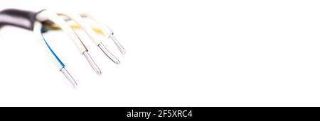 Electric cable without insulation isolated on white background with place for text. Stock Photo