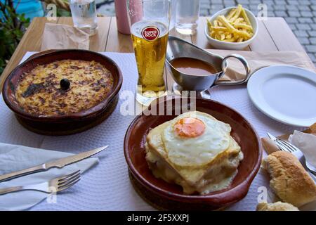 Francesinha is a typical food dish from the Porto region in Portugal. Stock Photo