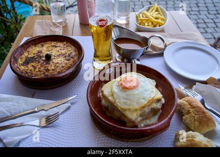 Francesinha is a typical food dish from the Porto region in Portugal. Stock Photo