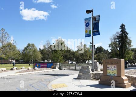 PASADENA, CALIFORNIA - 26 MAR 2021: Sign at Brookside Park and banners for the Kidspace Childrens Museum. Stock Photo