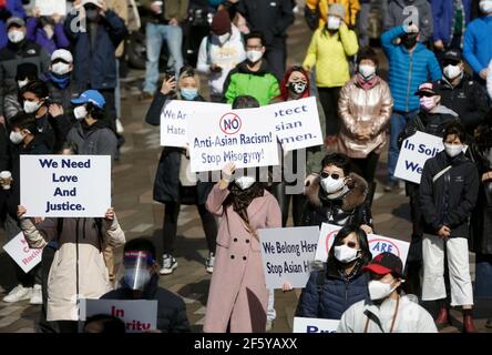 Vancouver, Canada. 28th Mar, 2021. People attend a Stop Asian Hate rally in Vancouver, British Columbia, Canada, on March 28, 2021. Hundreds of people took part in the rally against the racism toward Asians here on Sunday. Credit: Liang Sen/Xinhua/Alamy Live News Stock Photo