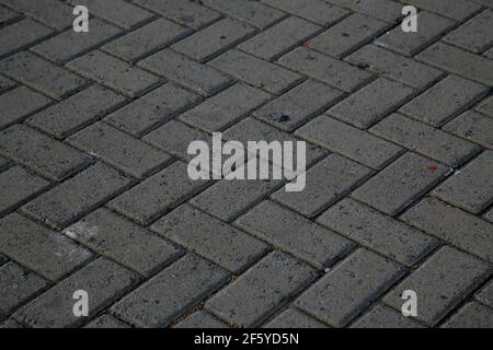 salvador, bahia, brazil - january 22, 2021: street pavement made of concrete brick in the Barra district in the city of Salvador. Stock Photo