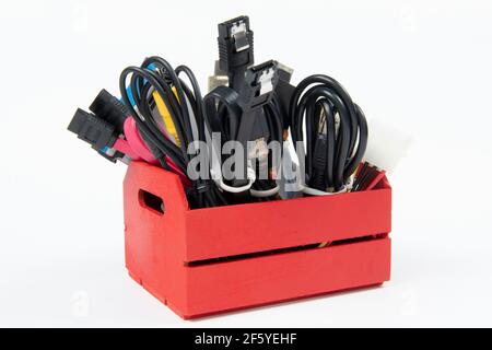 technological waste that remains in residence as computer cables Stock Photo
