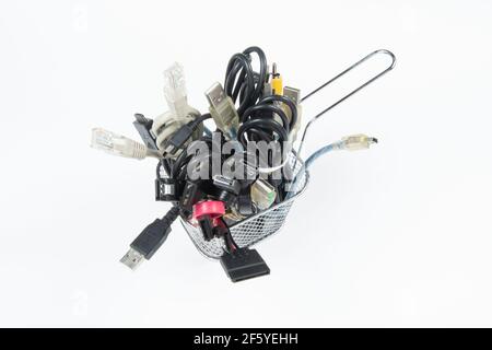 technological waste that remains in residence as computer cables Stock Photo