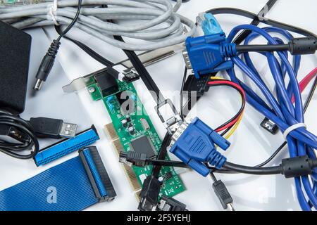 technological waste that remains in residence as computer cables Stock Photo