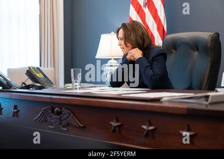 Washington, United States Of America. 04th Mar, 2021. U.S. Vice President Kamala Harris sits behind the new USS Constitution desk created by the Naval History and Heritage Command in the Eisenhower Executive Office Building in the White House March 28, 2021 in Washington, DC. The heritage desk was crafted using wood from the USS Constitution known as Old Ironsides. Credit: Planetpix/Alamy Live News Stock Photo