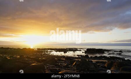 sunrise at the beach of Costa Calma on Fuerteventura Stock Photo