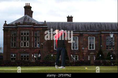 Simon Ledger tee's off at Vale Royal Abbey Golf Club, Cheshire following the easing of England's lockdown to allow far greater freedom outdoors. Picture date: Monday March 29, 2021. Stock Photo