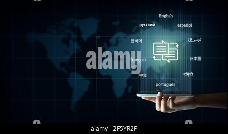 Mobile with speech bubble with arrows and text in many important languages. Illustration of World map background. Translator and languages education. Stock Photo