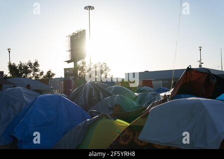 Tijuana, Mexico. 27th Mar, 2021. Migrants from Central America are stuck living in tents on the street in Tijuana, Mexico on the border while they wait for President Joe Biden to open the American border. Credit: Allison Dinner/ZUMA Wire/Alamy Live News Stock Photo