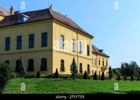 castle of eckartsau in a riverside forest nearby the danube river in the austrian national park donauauen in lower austria Stock Photo