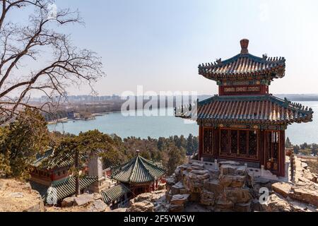 View from Longevity Hill at the Summer Palace across Kunming Lake towards Beijing, China in March 2013. Stock Photo