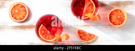 Orange cocktails panorama with blood oranges, top shot Stock Photo