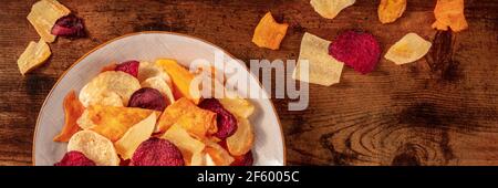 Vegetable chips panorama with copy space Stock Photo