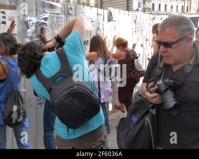 Madrid, Spain; June 11 2011. Photographers shooting people as they hit construction barrier. 15-M Indignados protests at Puerta del Sol in Madrid. Pho Stock Photo