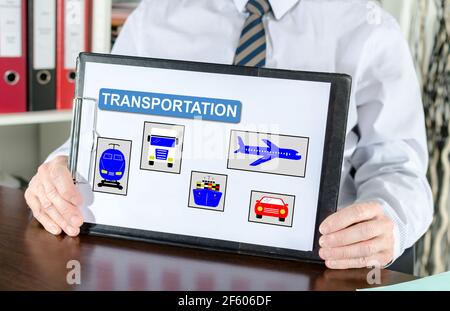 Transportation concept shown by a businessman Stock Photo