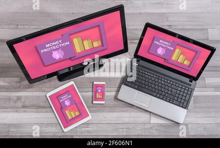 Money protection concept shown on different information technology devices Stock Photo
