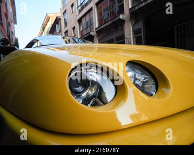 yellow Alfa Romeo Spider  GTV cabriolet roadster Stock Photo