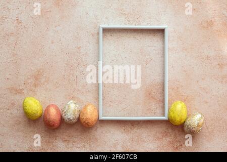 Happy easter background. Frame for text with easter eggs. Easter card with copy space for text. Stock Photo