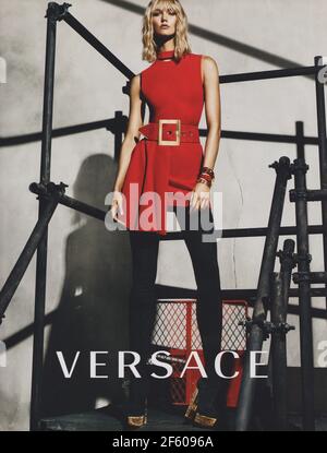 poster advertising VERSACE fashion house with Karlie Kloss in paper magazine from 2015 year, advertisement, creative VERSACE advert from 2010s Stock Photo