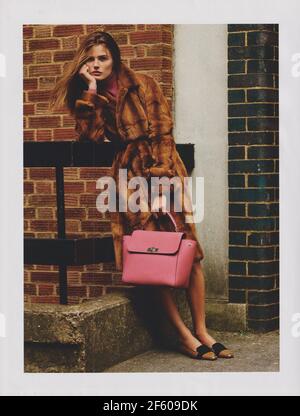 poster advertising Bally fashion house with Edita Vilkeviciute in paper magazine from 2015 year, advertisement, creative Bally advert from 2010s Stock Photo