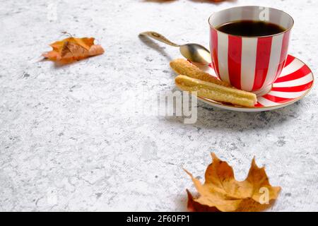 Coffee in a cup, cookies and gray background Stock Photo