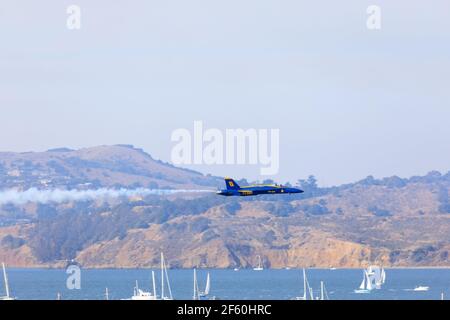 McDonnell Douglas F/A-18 Hornets of the US Navy Flight Demonstration Squadron, The Blue Angels, perform over San Francisco during Fleet Week Nov 2019. Stock Photo