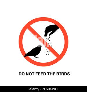 Prohibition sign with text do not feed the birds and hand silhouette giving food to pigeon Stock Vector