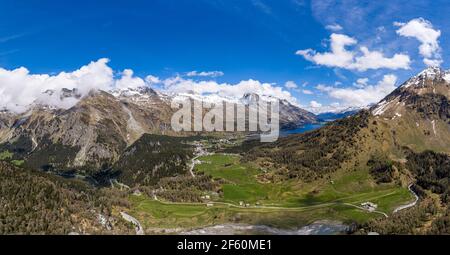 Stunning aerial panorama of the Maloja pass in Engadine region with the Sils lake in canton Graubunden in the alps in Switzerland Stock Photo