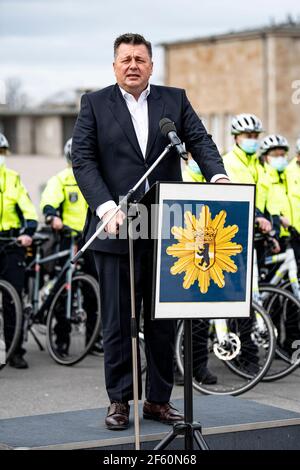 Berlin, Germany. 29th Mar, 2021. Andreas Geisel (SPD), Senator for the Interior and Sport, speaks during a press conference of the Berlin police to present the new bicycle lanes in front of the Olympic Stadium. Credit: Fabian Sommer/dpa/Alamy Live News Stock Photo