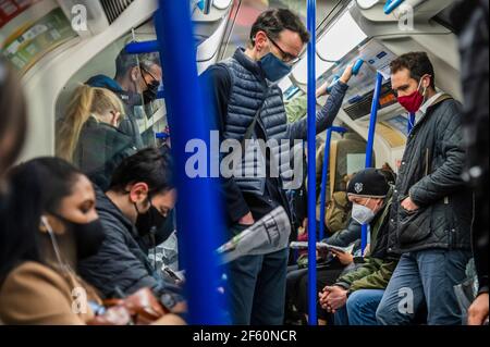 London, UK. 29th Mar, 2021. The underground is busy on the morning of the new stage 1c of the easing of the national Lockdown. Credit: Guy Bell/Alamy Live News Stock Photo