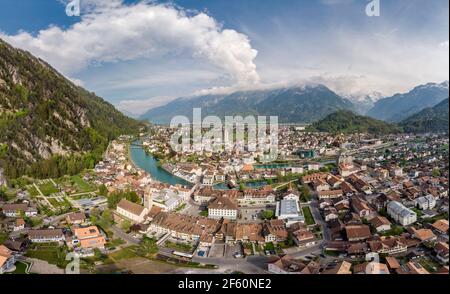 Aerial panorama of the famous Interlaken old town at the foot of the Jungfrau region in the alps in Canton Bern in Switzerland Stock Photo