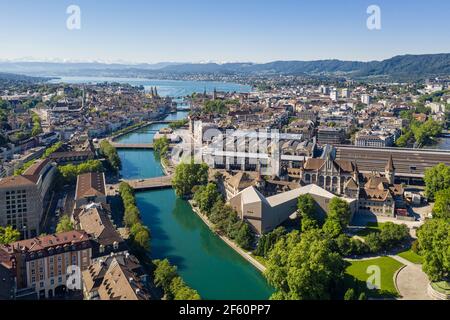 Aerial view of the Limmat river that flow through the Zurich city center by the national museum, the train station and the old town to finish in lake Stock Photo