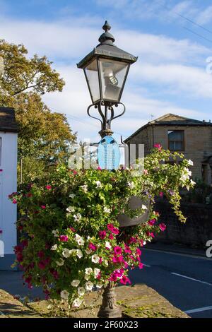 Old traditional lamp erected on the site of Honley's first public gas lamp of 1858 Stock Photo