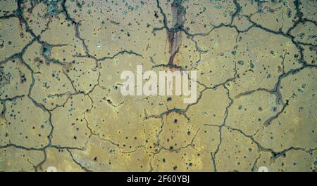 background picture, old yellow painted cracked concrete Stock Photo