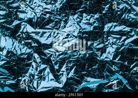 Turquoise background crumpled foil. textured metallic background, Stock Photo