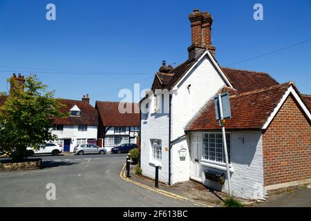Typical white painted historic cottages, Hartfield, East Sussex, England Stock Photo