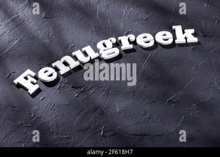 Fenugreek word in wooden letters Stock Photo