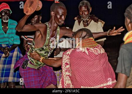 Tribal dance of Turkana people. Turkana are a Nilotic people native to the Turkana County in northwest Kenya Stock Photo