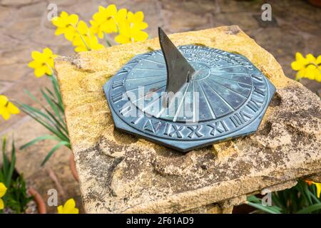 Sundial on stone pillar Stock Photo