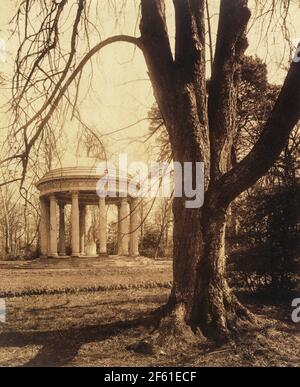 The Temple of Love, Palace of Versailles, Petit Trianon, Versailles, France circa 1902 by Eugene Atget.  Eugène Atget, full name Jean-Eugène-Auguste Atget, 1857 - 1927.  French photographer, famed for his decades long work to document the architecture and aura of Paris before all was lost to modernisation. Stock Photo